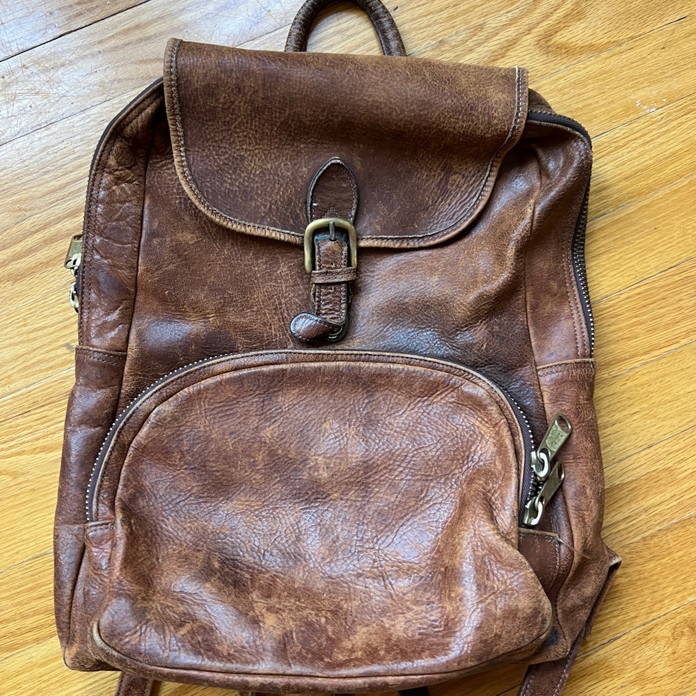vintage brown leather backpack